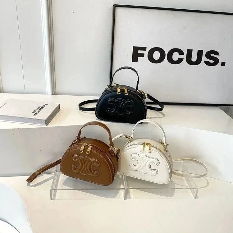 Celine Mini Oval Bag with Logo Embossing in Black Brown White