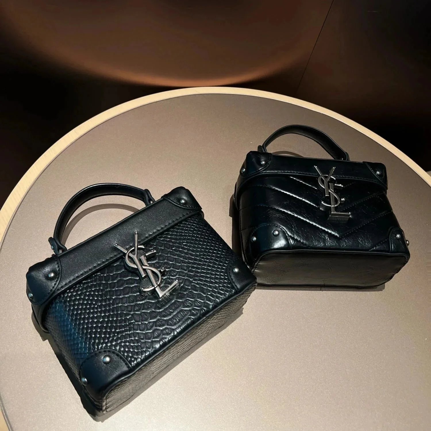 Saint Laurent Black Leather Handbags with YSL Logo