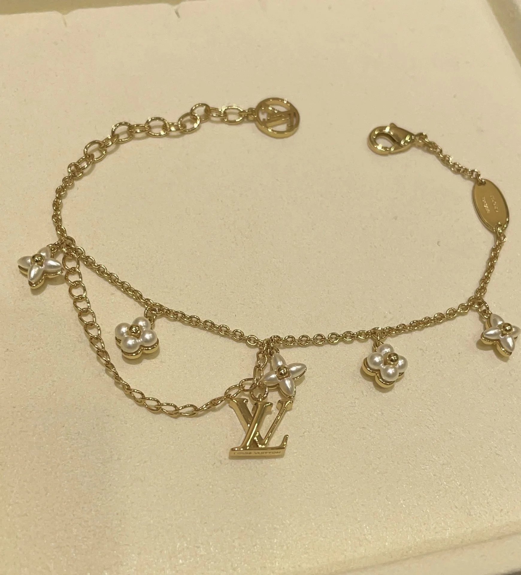 Louis Vuitton Gold Chain Bracelet with Flower Charms and LV Logo
