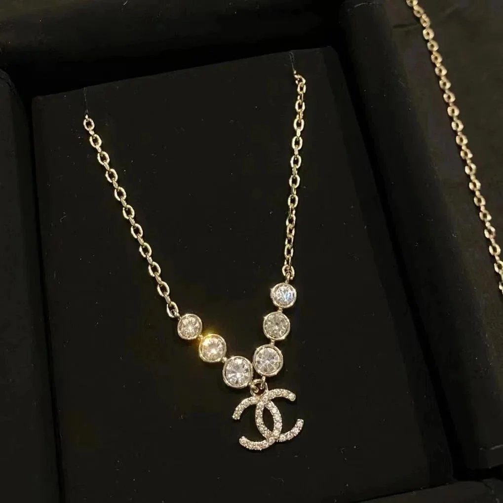 Chanel Gold Necklace with Crystal CC Logo Pendant