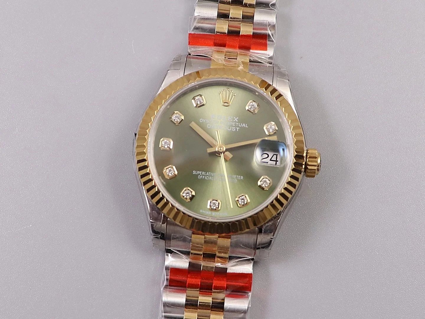 Rolex Datejust Two-Tone Watch with Green Dial and Diamond Markers