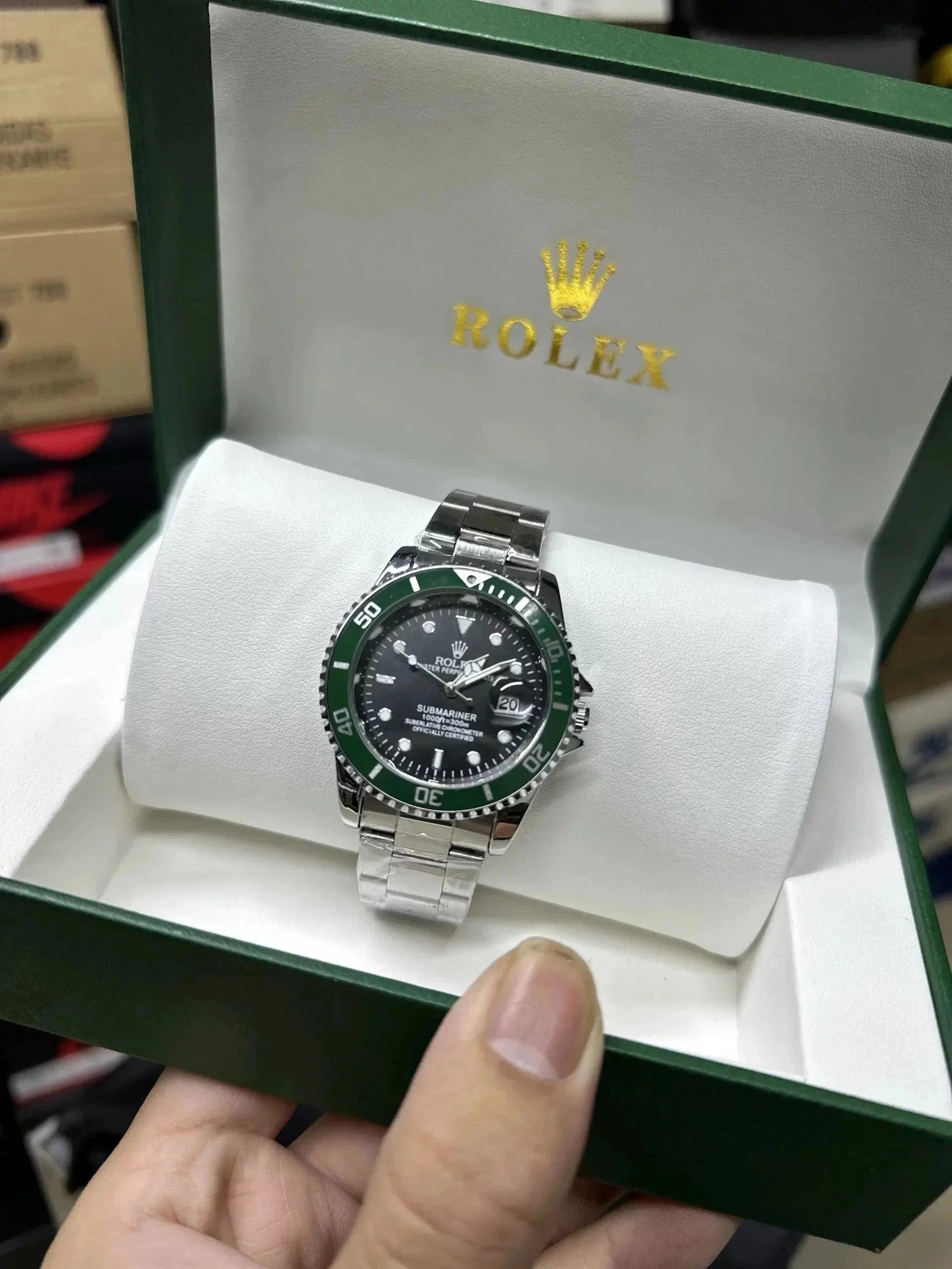 Rolex Submariner Watch with Green Bezel and Stainless Steel Bracelet