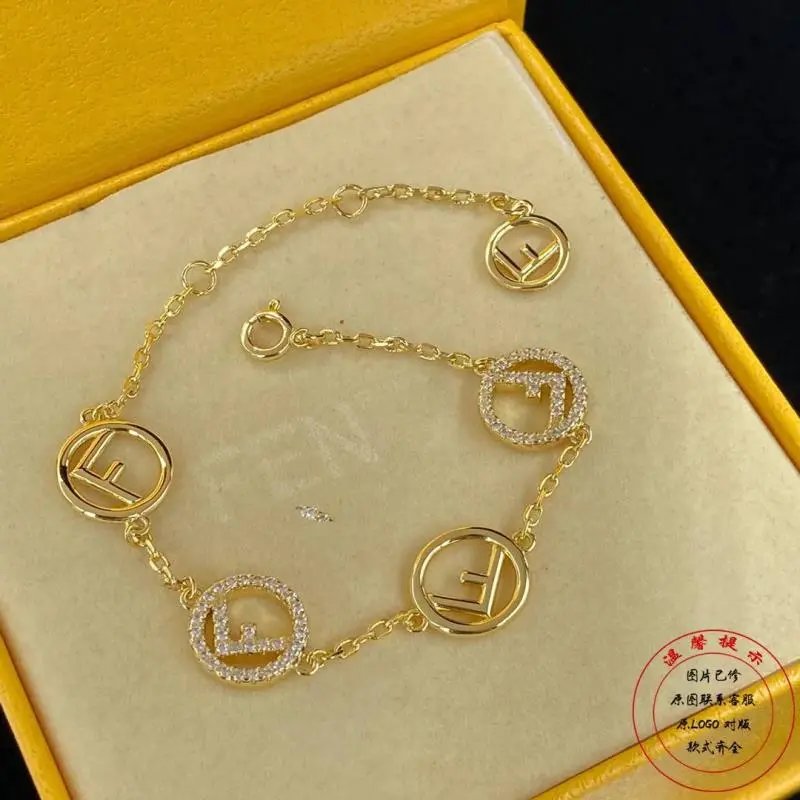 Luxury Gold Tone Bracelet with LV Logo and Crystal Accents