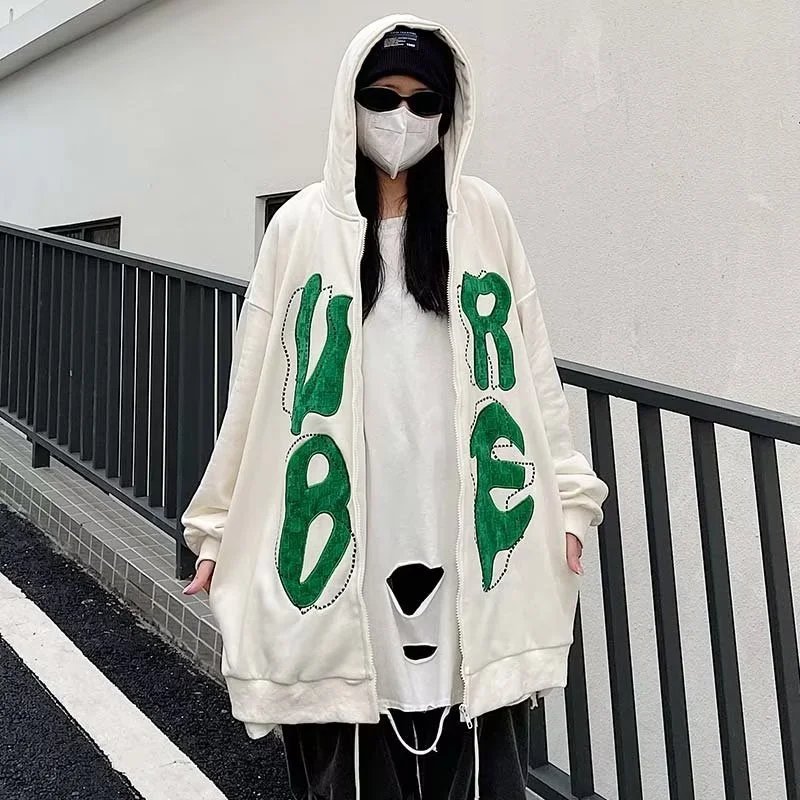 Oversized White Hoodie with Green Lettering and Face Design