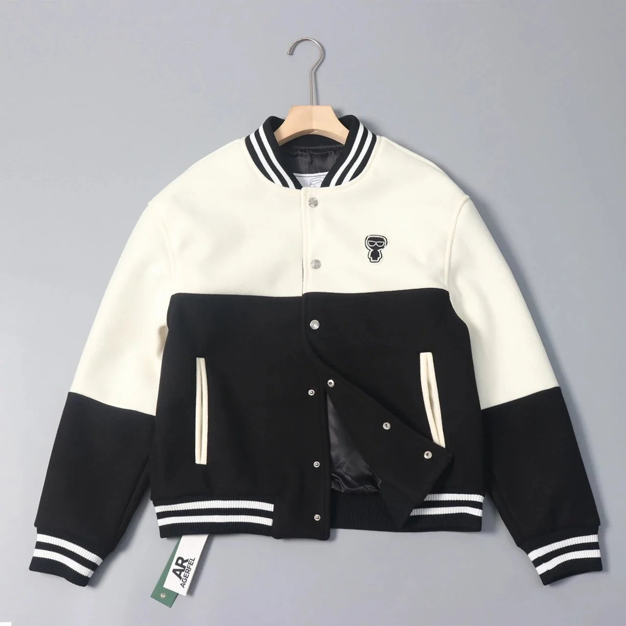 Black and White Varsity Jacket with Skull Logo