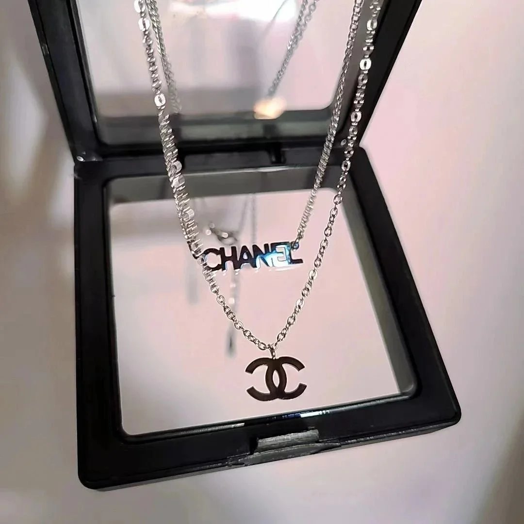 Chanel Silver Necklace with CC Logo Pendant