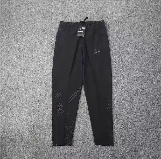 Nike Men's Black Performance Jogger Pants with Geometric Design