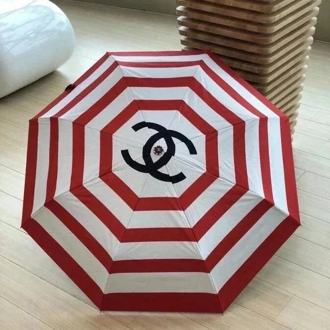 Red and White Striped Chanel Logo Beach Umbrella