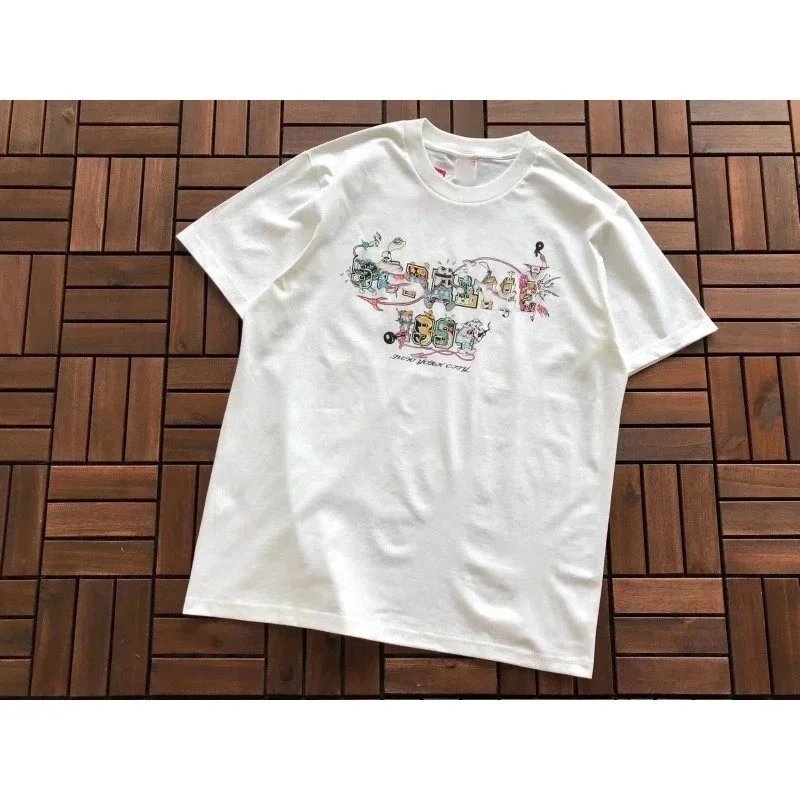 White Hello Kitty T-Shirt with Colorful Graphic Design